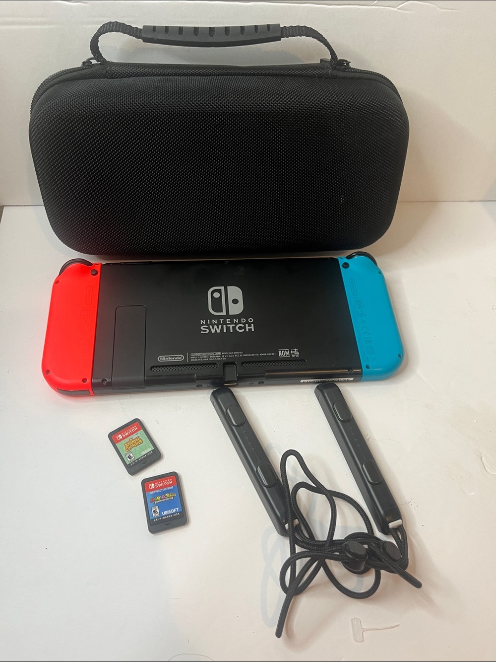 Nintendo Switch with Neon Red & Neon Blue Joy-Con, Case and Accessories